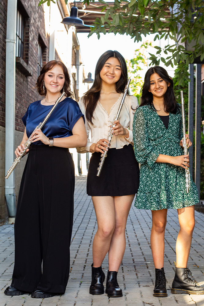 3 girls holding Azumi flutes